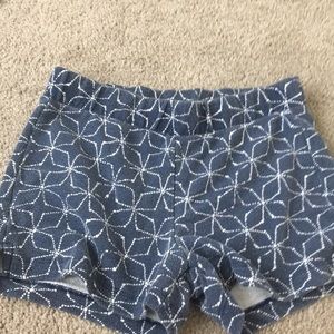 Navy Colored shorts with a white diamond print.